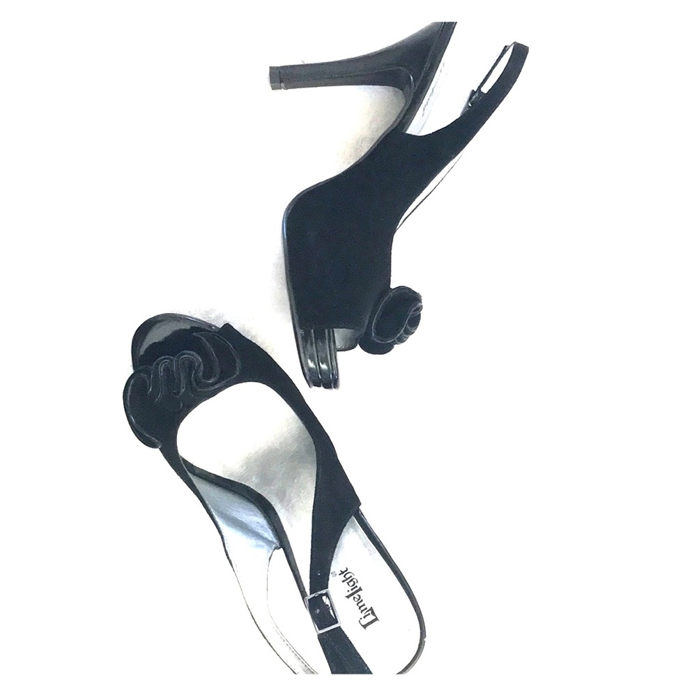 Limelight Black sling back stilettos,with bow